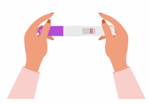 hands hold a positive pregnancy test